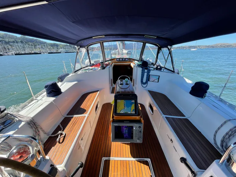 Slide: The Image of Interior view of 2000 Jeanneau 52.2 sailboat cockpit with navigation equipment. - 23