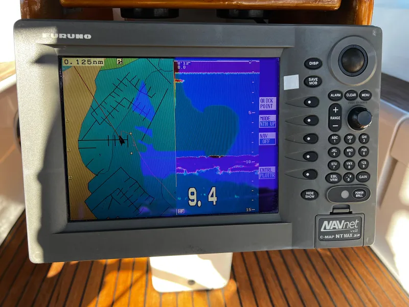 Slide: The Image of Navigation system on a 2000 Jeanneau 52.2 sailboat displaying nautical chart. - 45