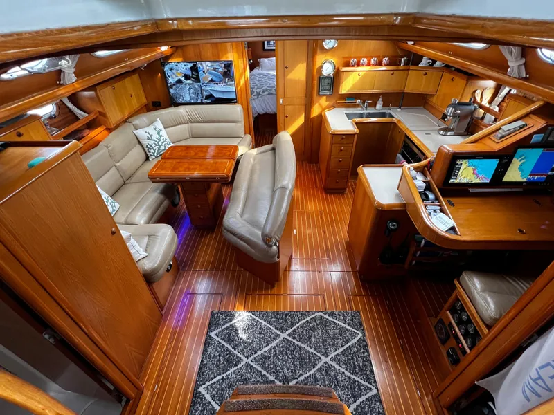 Slide: The Image of Luxurious interior of 2000 Jeanneau 52.2 yacht with wood finish and modern amenities. - 47