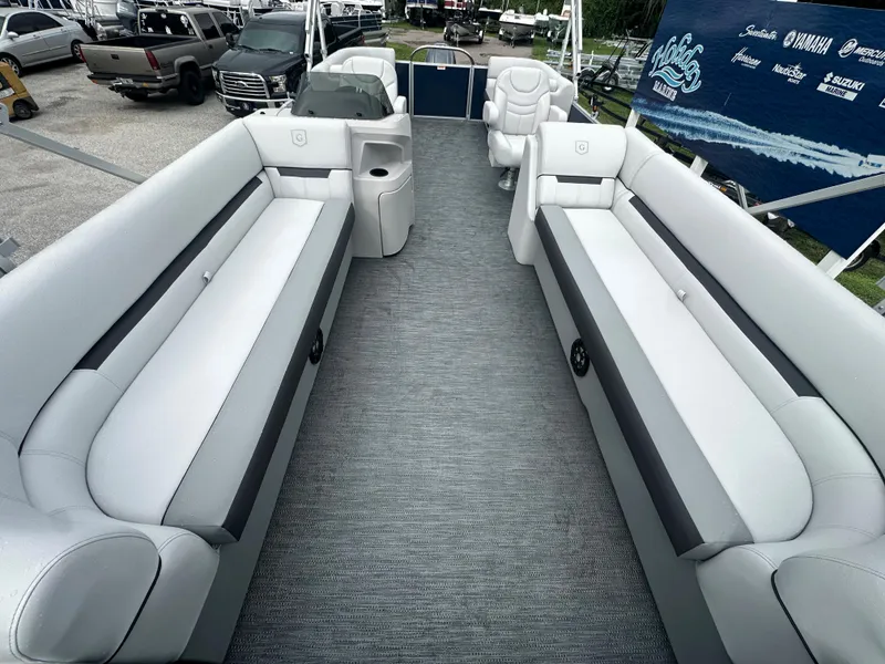 Slide: The Image of 2024 Sweetwater 2286 SB pontoon boat interior with spacious seating and modern design. - 11