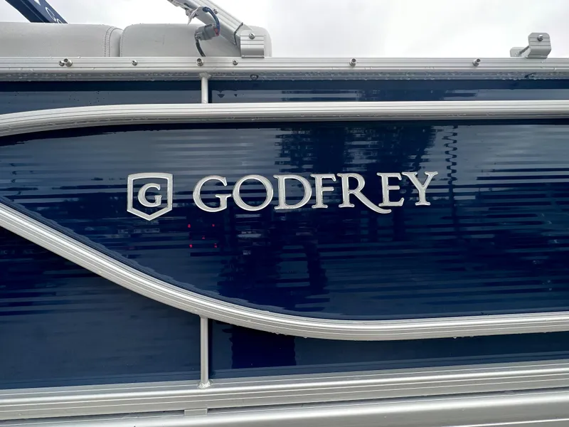 Slide: The Image of 2024 Sweetwater 2286 SB pontoon boat with Godfrey branding. - 4