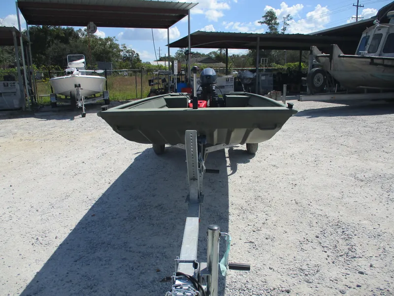 Slide: The Image of 2022 Alweld 1542 MARSH LF boat on trailer in outdoor storage area. - 5