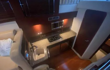 Slide: The Image of Interior of 2007 Sea Ray 36 Sedan Bridge yacht kitchen area. - 15