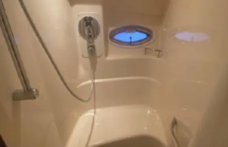 Slide: The Image of Shower area in 2007 Sea Ray 36 Sedan Bridge yacht with porthole window. - 28