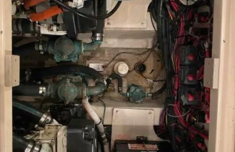 Slide: The Image of Engine room of 2007 Sea Ray 36 Sedan Bridge with visible wiring and components. - 30