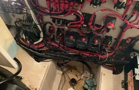 Slide: The Image of Electrical wiring and components inside a 2007 Sea Ray 36 Sedan Bridge boat. - 31