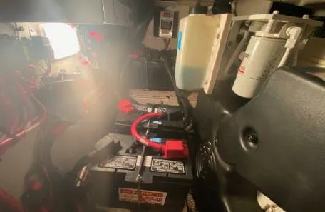 Slide: The Image of Engine room of 2007 Sea Ray 36 Sedan Bridge with battery and wiring. - 33