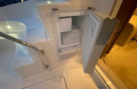 Slide: The Image of Open mini fridge on 2007 Sea Ray 36 Sedan Bridge yacht. - 39