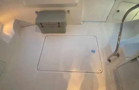 Slide: The Image of 2007 Sea Ray 36 Sedan Bridge deck with storage hatch and cooler. - 40