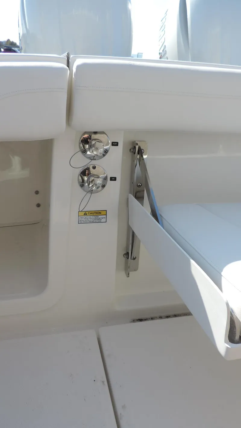 Slide: The Image of 2024 Regulator 23 Center Console boat interior detail with seating and fixtures. - 10