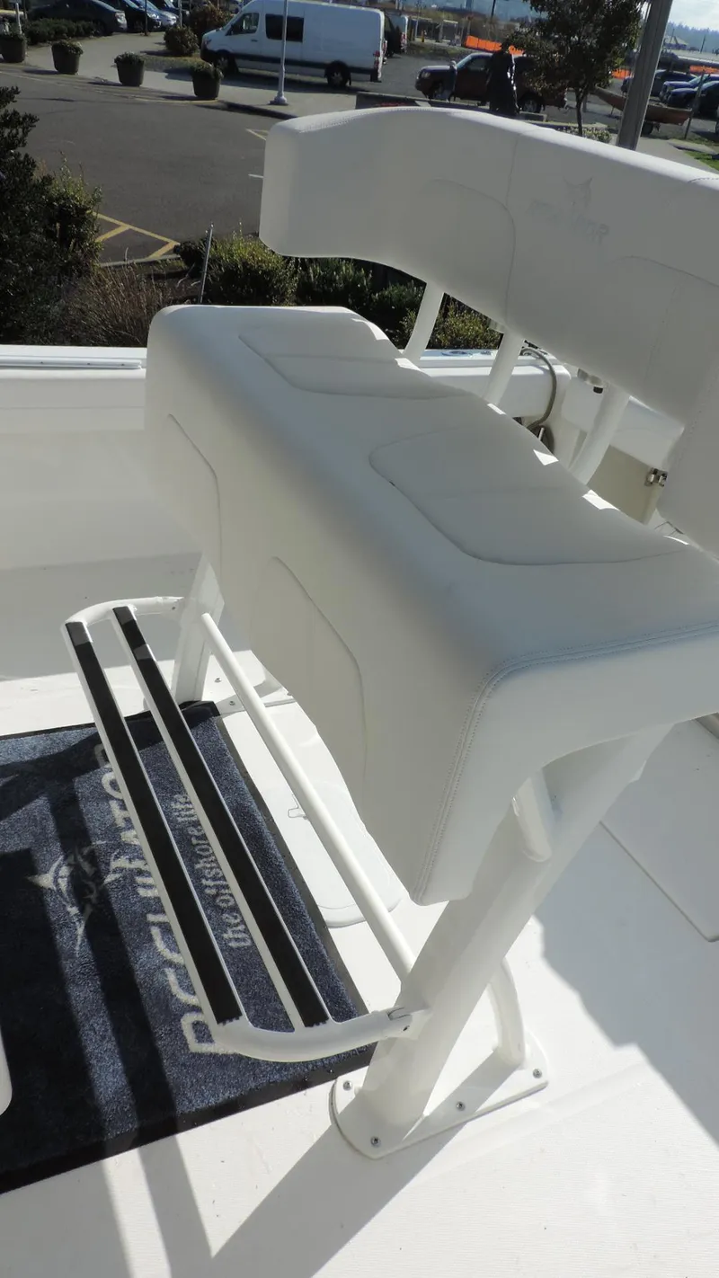 Slide: The Image of 2024 Regulator 23 Center Console boat seating and footrest detail. - 21