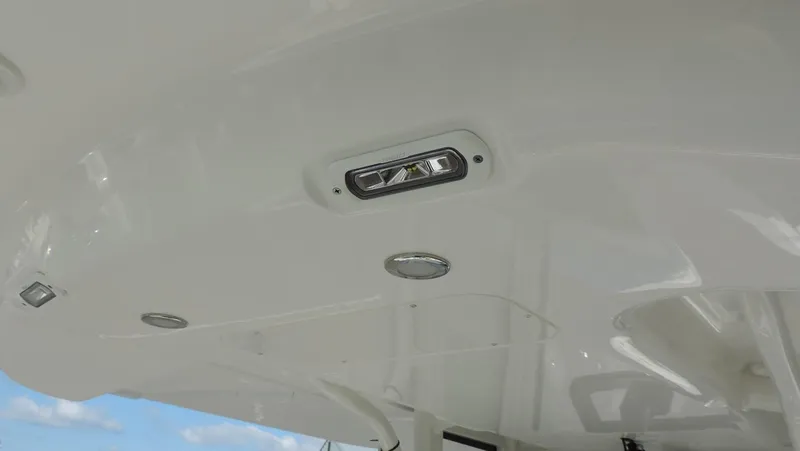 Slide: The Image of 2024 Regulator 23 Center Console boat ceiling with integrated lighting fixtures. - 25