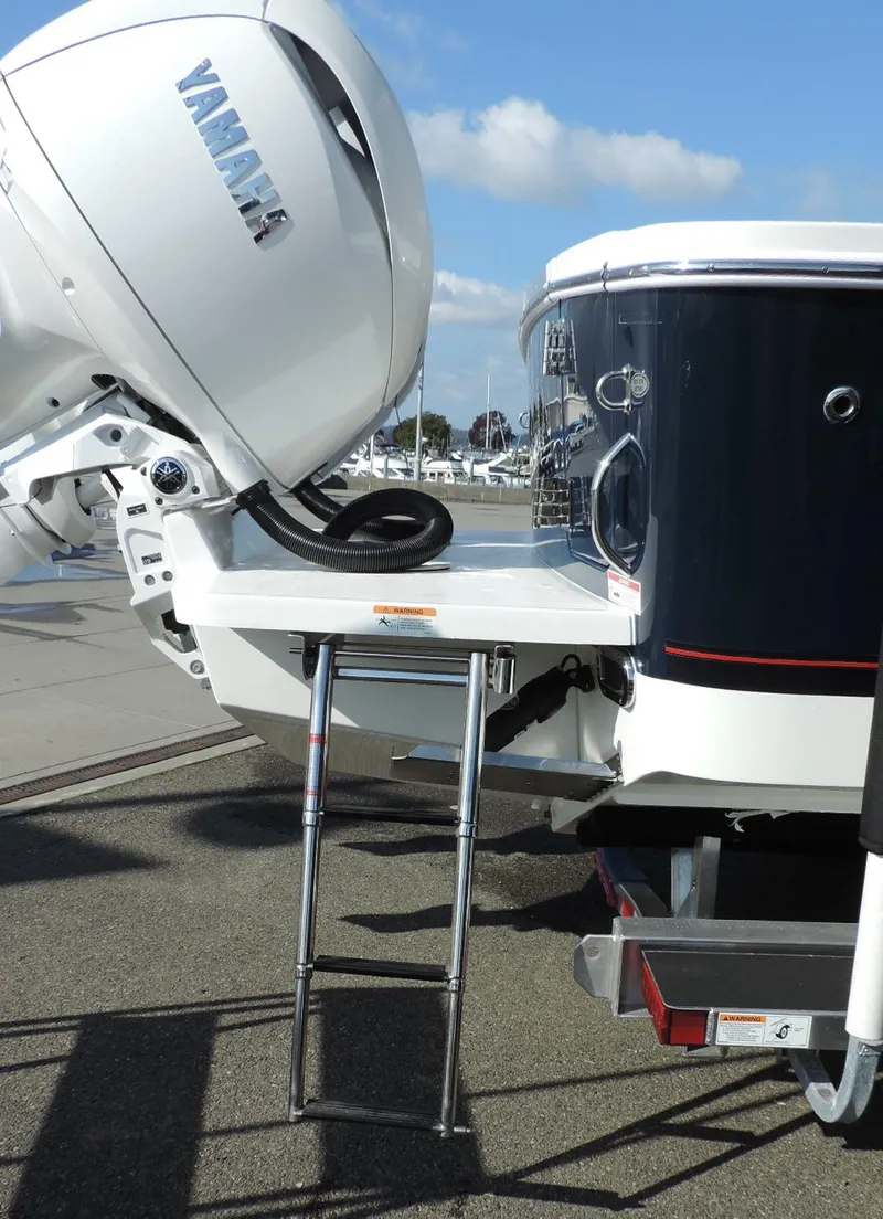 Slide: The Image of 2024 Regulator 23 Center Console with Yamaha engine and boarding ladder. - 8