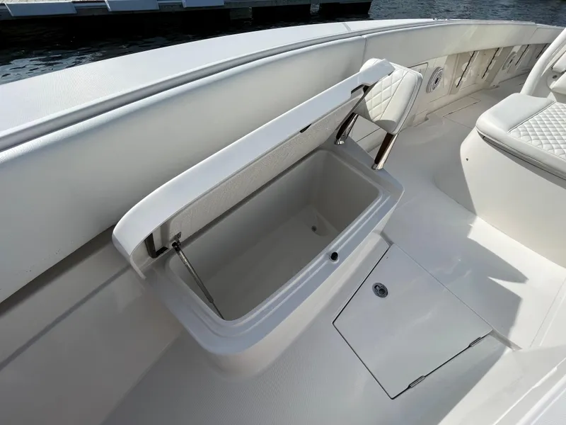 Slide: The Image of 2020 Jupiter 34 Center Console boat with open storage compartment. - 16