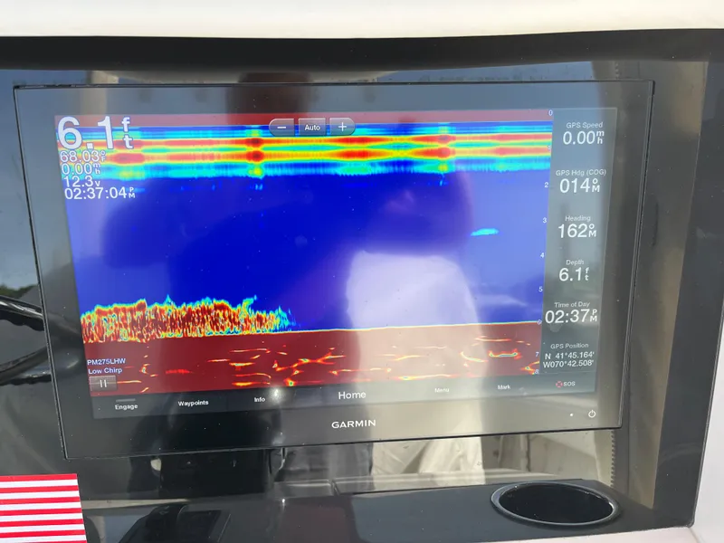 Slide: The Image of Garmin fishfinder display on 2020 Jupiter 34 Center Console boat. - 24