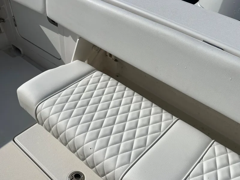 Slide: The Image of Quilted white seating on 2020 Jupiter 34 Center Console boat. - 34