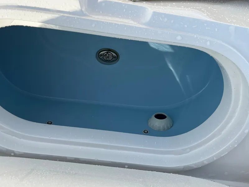 Slide: The Image of Livewell compartment of 2020 Jupiter 34 Center Console boat. - 35