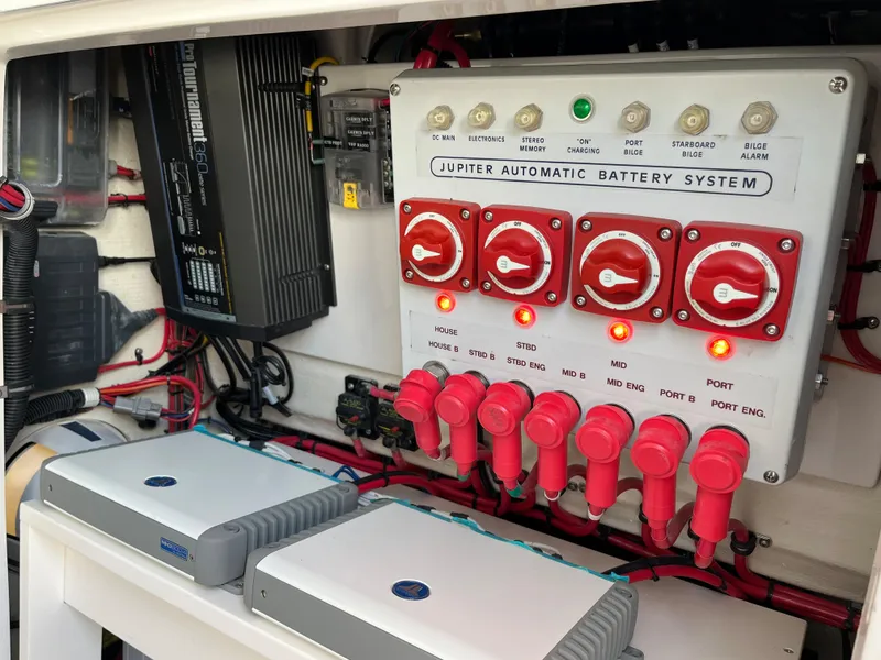 Slide: The Image of Jupiter 34 Center Console 2020 automatic battery system with control panel and wiring. - 41