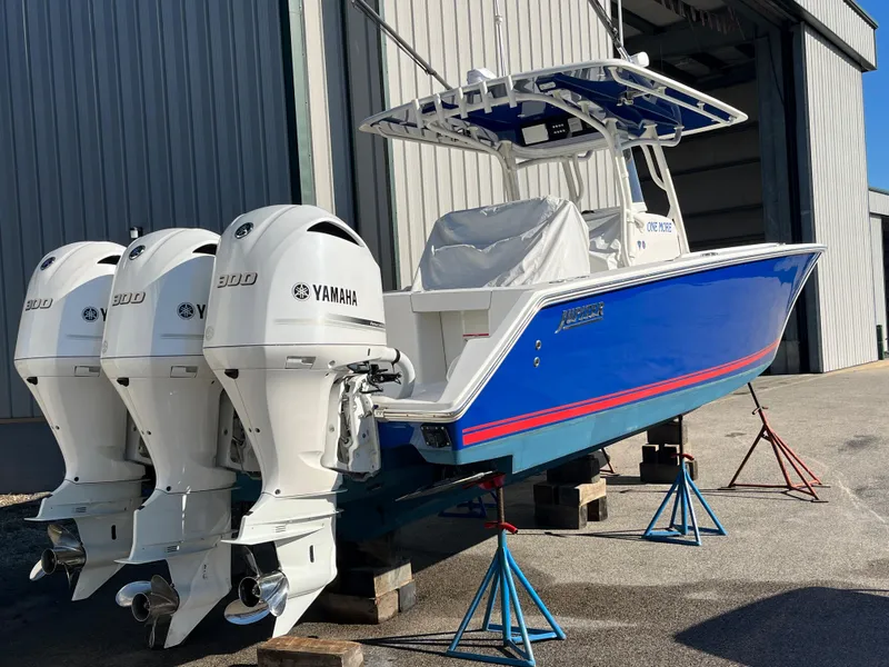 Slide: The Image of 2020 Jupiter 34 Center Console boat with triple Yamaha 300 engines. - 7