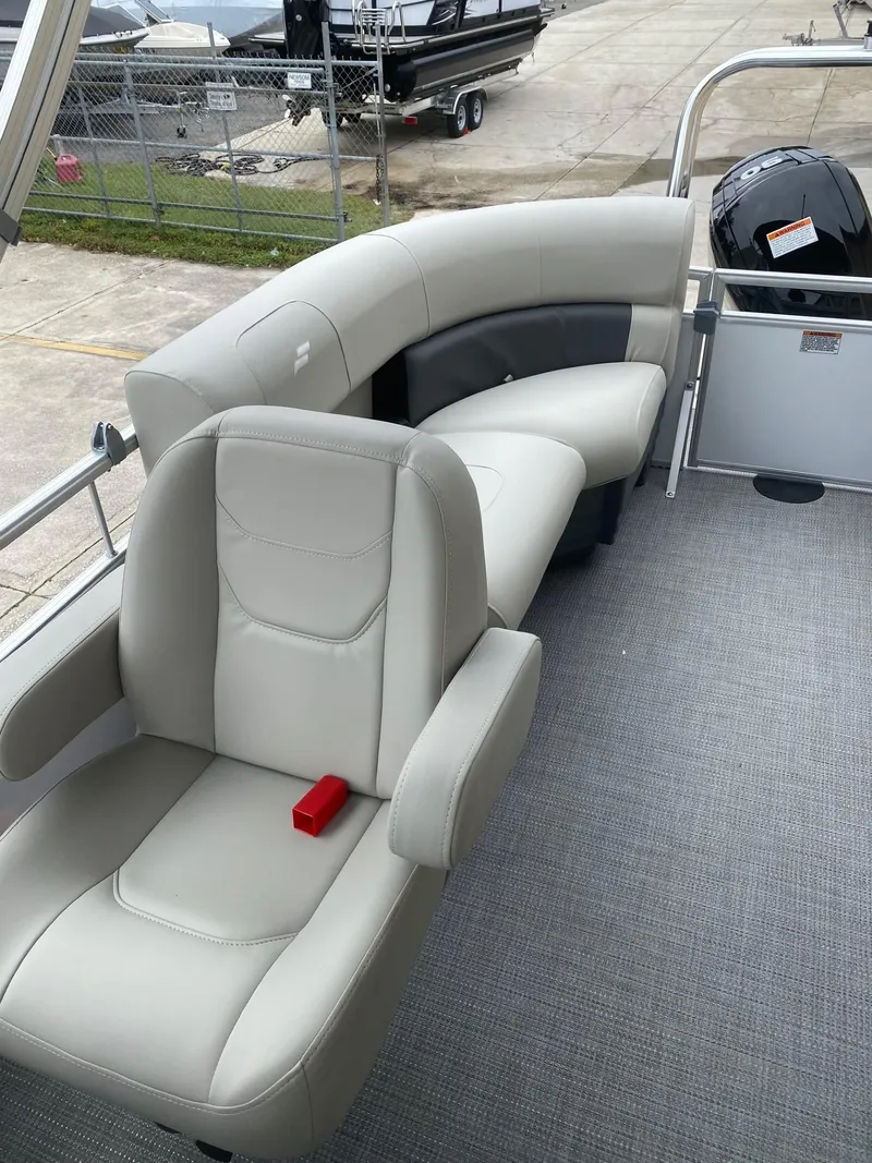 Slide: The Image of 2024 Starcraft LX 20 R boat interior with plush seating and modern design. - 7