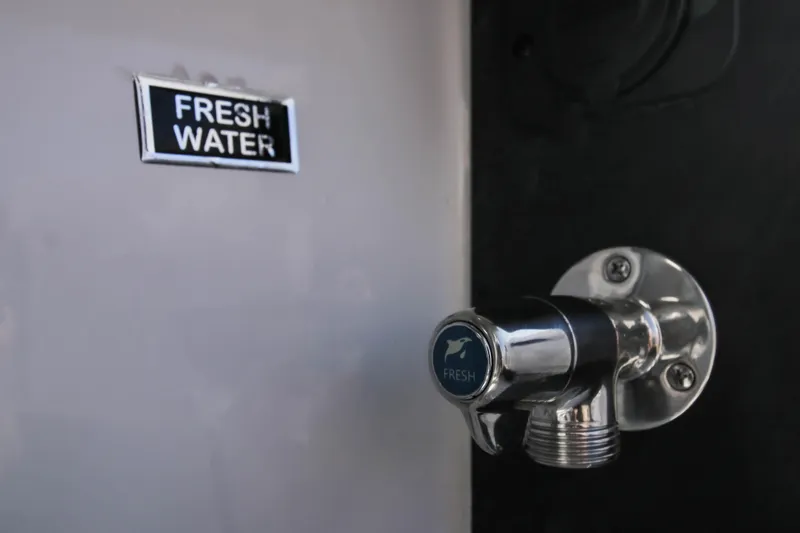 Slide: The Image of Fresh water faucet on 2023 Blackfin 272 CC boat. - 22