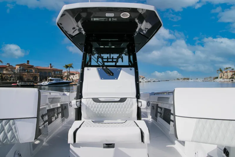 Slide: The Image of 2023 Blackfin 302 CC boat interior with luxurious seating and modern design. - 11