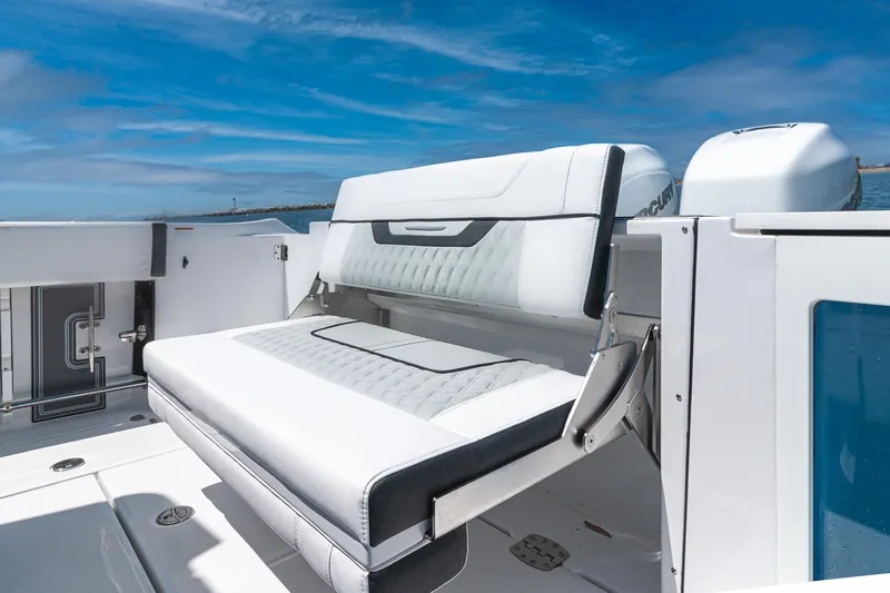 Slide: The Image of 2024 Blackfin 332 CC boat with luxurious seating and sleek design. - 7