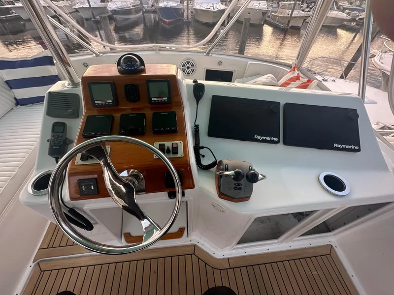 Slide: The Image of Helm of 1993 Ocean Yachts 42 Flybridge with Raymarine navigation equipment. - 10