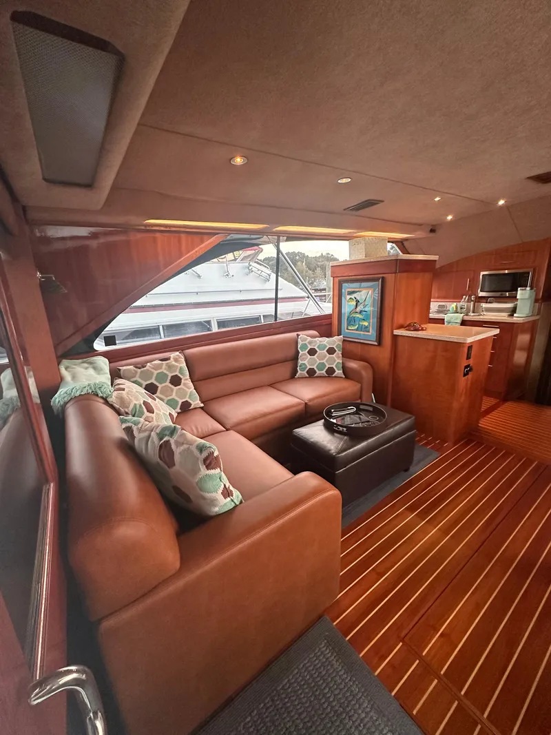 Slide: The Image of Luxurious interior of 1993 Ocean Yachts 42 Flybridge with leather seating and modern amenities. - 12