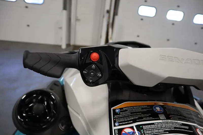 Slide: The Image of 2025 Sea-Doo GTI SE 130 handlebars in a garage setting. - 15