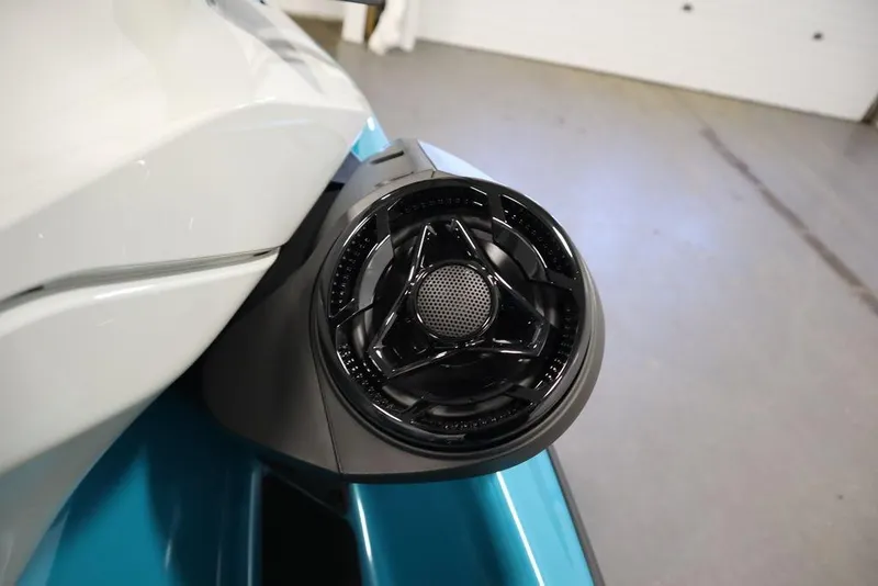 Slide: The Image of 2025 Sea-Doo GTI SE 130 close-up, showcasing sleek blue design and Rotax engine detail. - 21