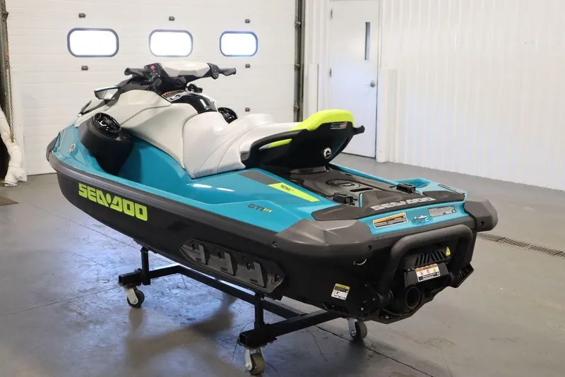Slide: The Image of 2025 Sea-Doo GTI SE 130 jet ski, sleek design, blue and white color scheme. - 8