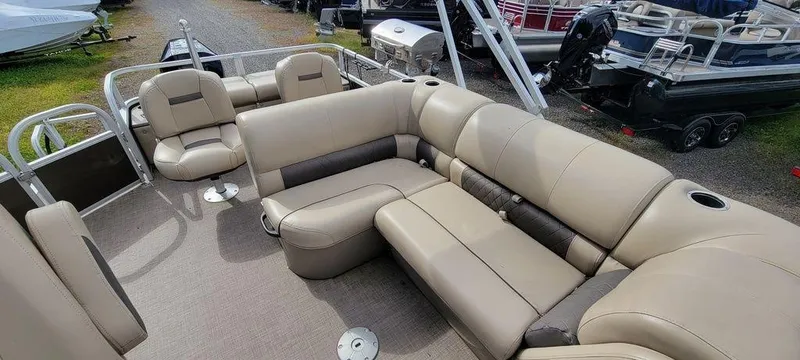 Slide: The Image of 2020 Sun Tracker 22 SPORT FISH XP3 pontoon boat with spacious beige seating. - 10