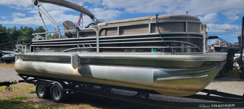 Slide: The Image of 2020 Sun Tracker 22 SPORT FISH XP3 pontoon boat on trailer, side view. - 2