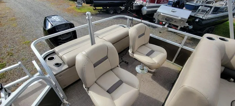 Slide: The Image of 2020 Sun Tracker 22 SPORT FISH XP3 pontoon boat interior with beige seating. - 7