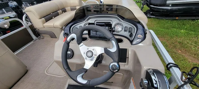 Slide: The Image of 2020 Sun Tracker 22 SPORT FISH XP3 boat dashboard with steering wheel and controls. - 8