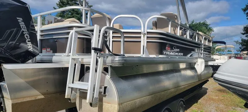 Slide: The Image of 2020 Sun Tracker 22 SPORT FISH XP3 pontoon boat with Mercury engine, parked outdoors. - 9