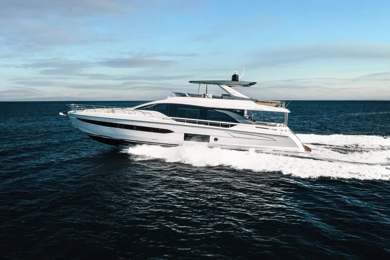 Slide: The Image of 2024 Azimut Fly 78 luxury yacht cruising on open water. - 0
