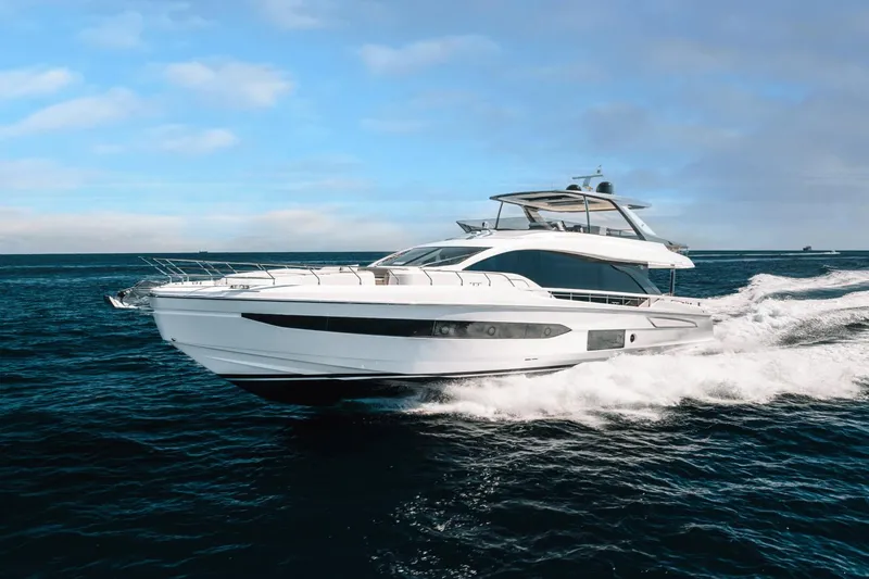 Slide: The Image of 2024 Azimut Fly 78 luxury yacht cruising on open water. - 1