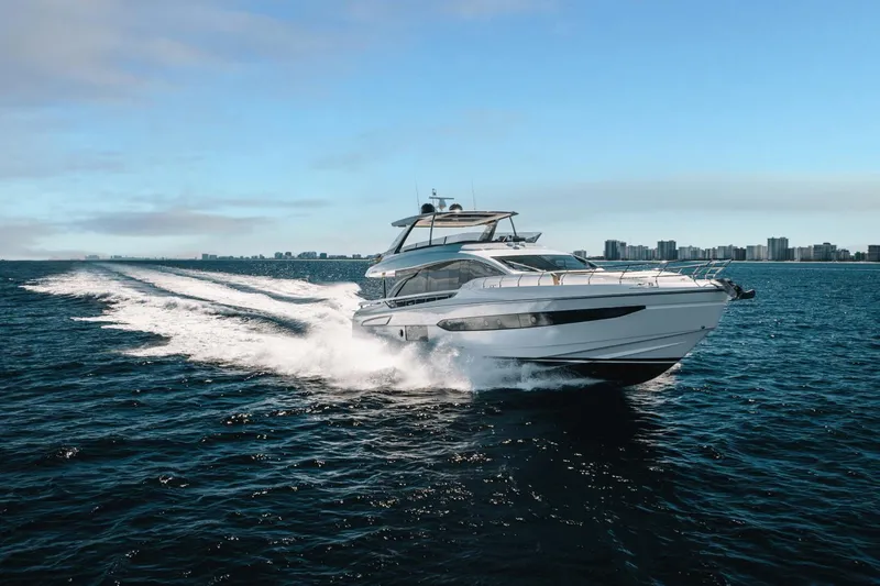 Slide: The Image of Azimut Fly 78 yacht cruising on open water, 2024 model. - 10