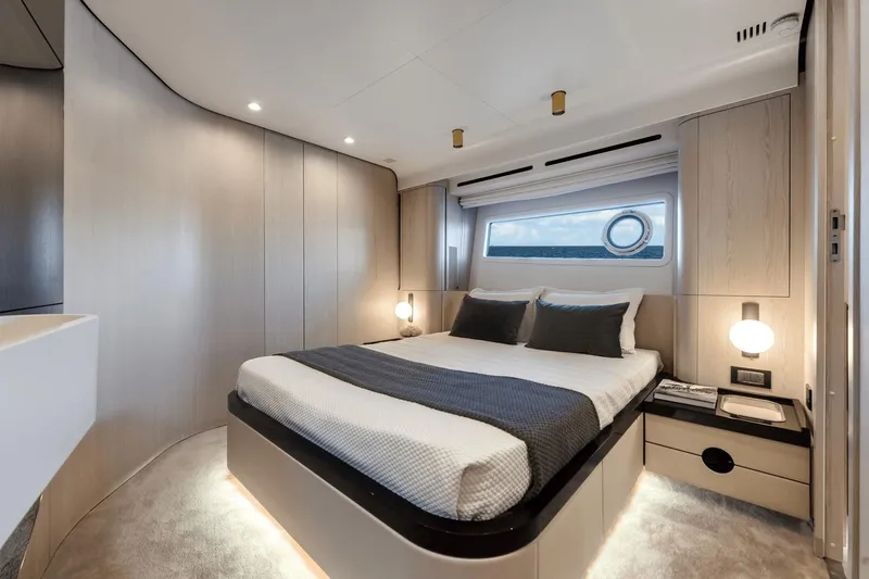 Slide: The Image of Luxurious bedroom interior of 2024 Azimut Fly 78 yacht with modern design and ocean view. - 12