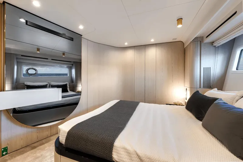 Slide: The Image of Luxurious bedroom interior of 2024 Azimut Fly 78 yacht with modern design and ambient lighting. - 14