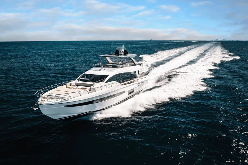 Slide: The Image of 2024 Azimut Fly 78 yacht cruising on open water. - 2