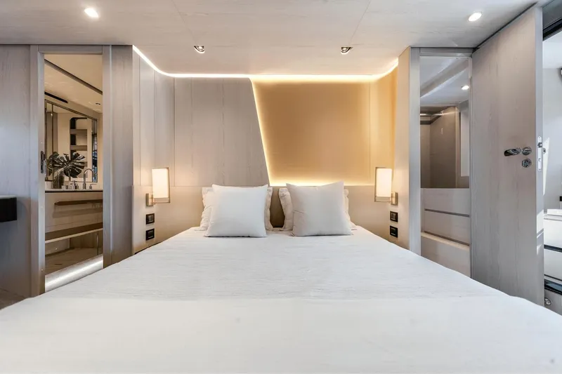 Slide: The Image of Luxurious bedroom interior of 2024 Azimut Fly 78 yacht with modern lighting. - 23