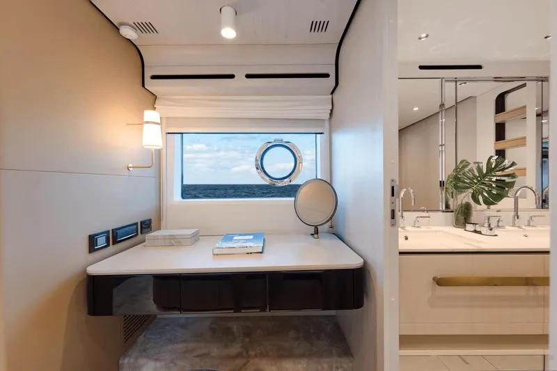 Slide: The Image of Luxurious interior of 2024 Azimut Fly 78 yacht with ocean view and modern vanity area. - 26