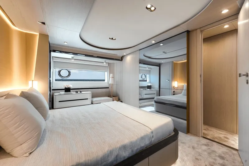 Slide: The Image of Luxurious bedroom interior of 2024 Azimut Fly 78 yacht with modern design and ocean view. - 29
