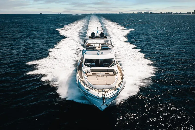 Slide: The Image of 2024 Azimut Fly 78 luxury yacht cruising on open water. - 3