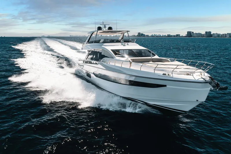 Slide: The Image of 2024 Azimut Fly 78 yacht cruising on open water. - 4