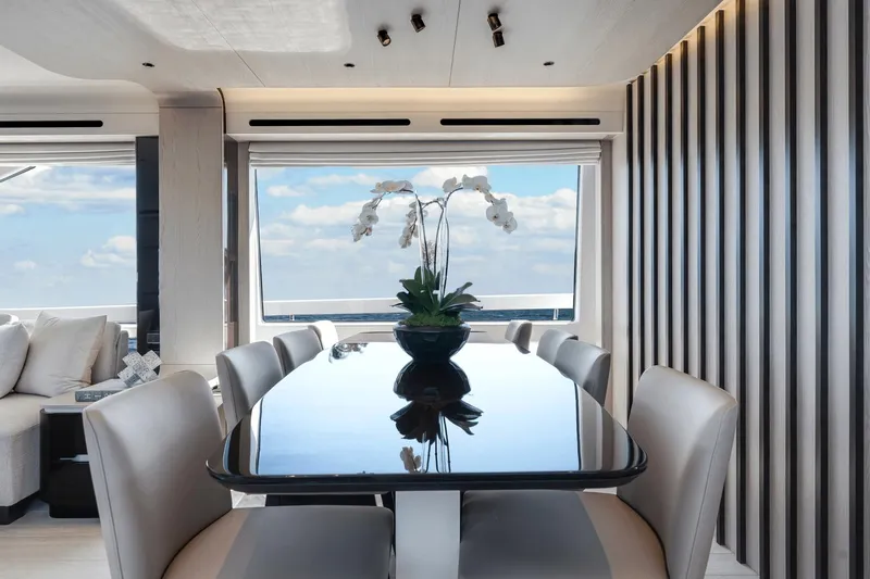 Slide: The Image of Luxurious dining area on the 2024 Azimut Fly 78 yacht with ocean view. - 41