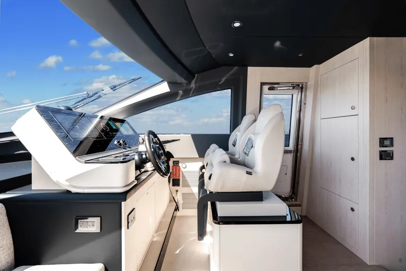 Slide: The Image of Interior helm station of 2024 Azimut Fly 78 yacht with modern controls and luxurious seating. - 44